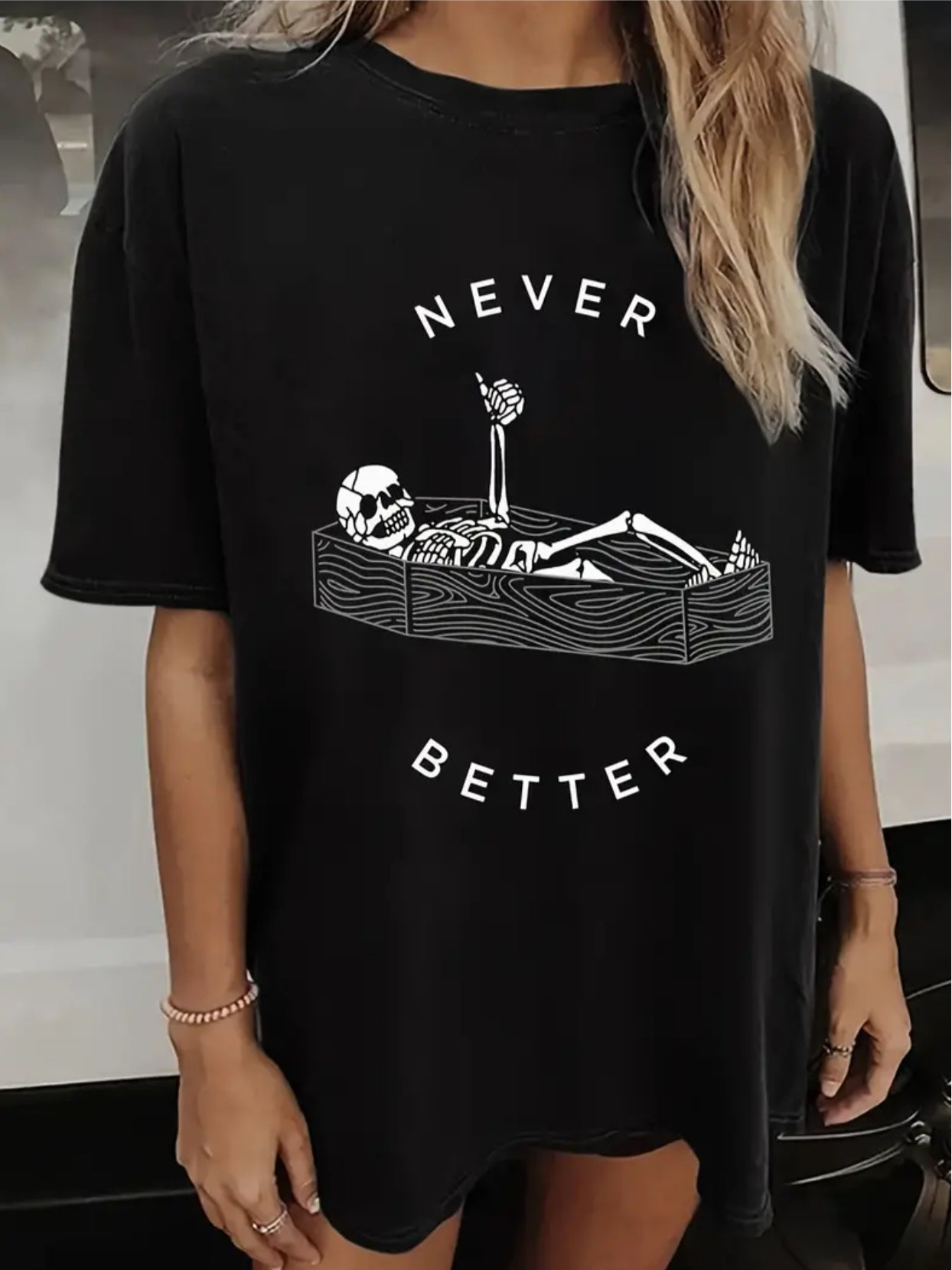 Camiseta informal de manga corta con cuello redondo y estampado “Skeleton's Say Never Better”