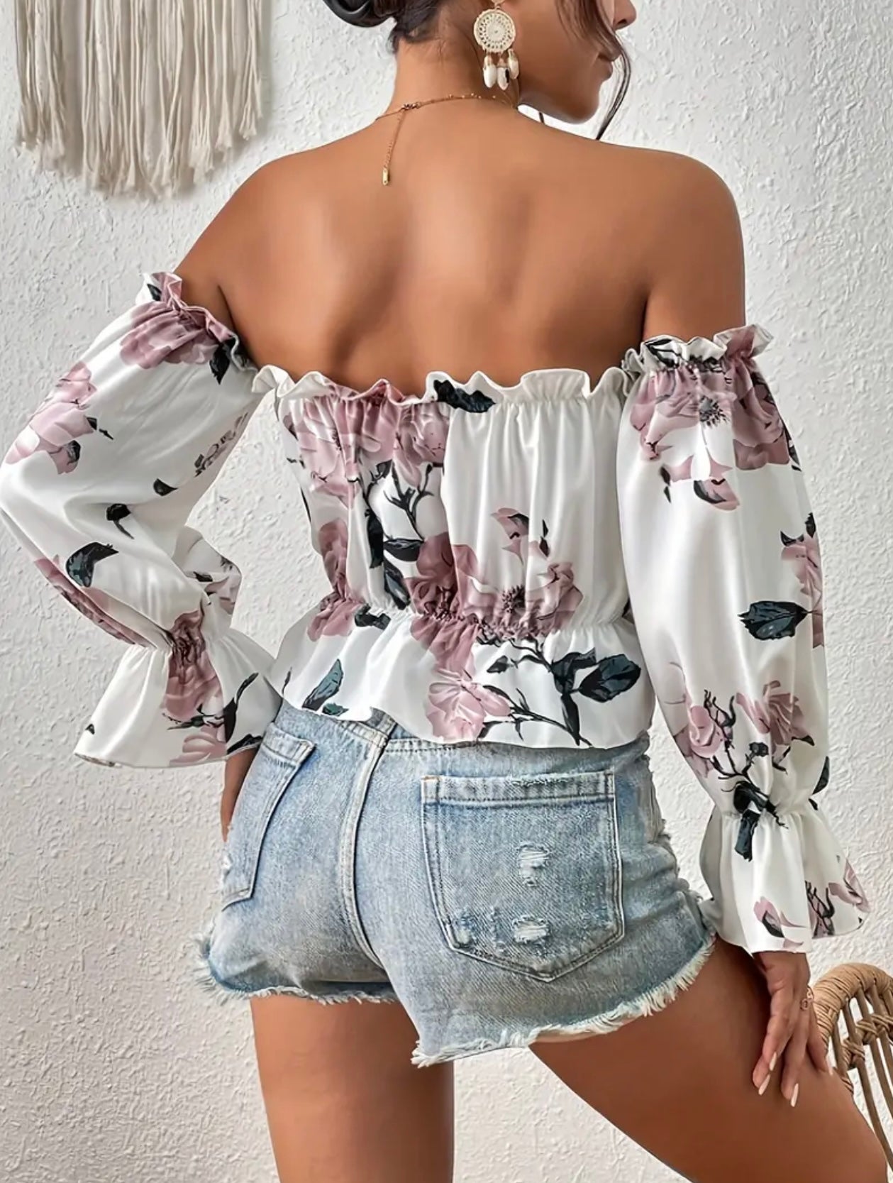 Blusa con hombros descubiertos y estampado floral toscano