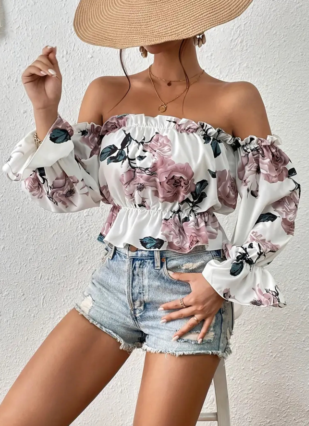 Blusa con hombros descubiertos y estampado floral toscano