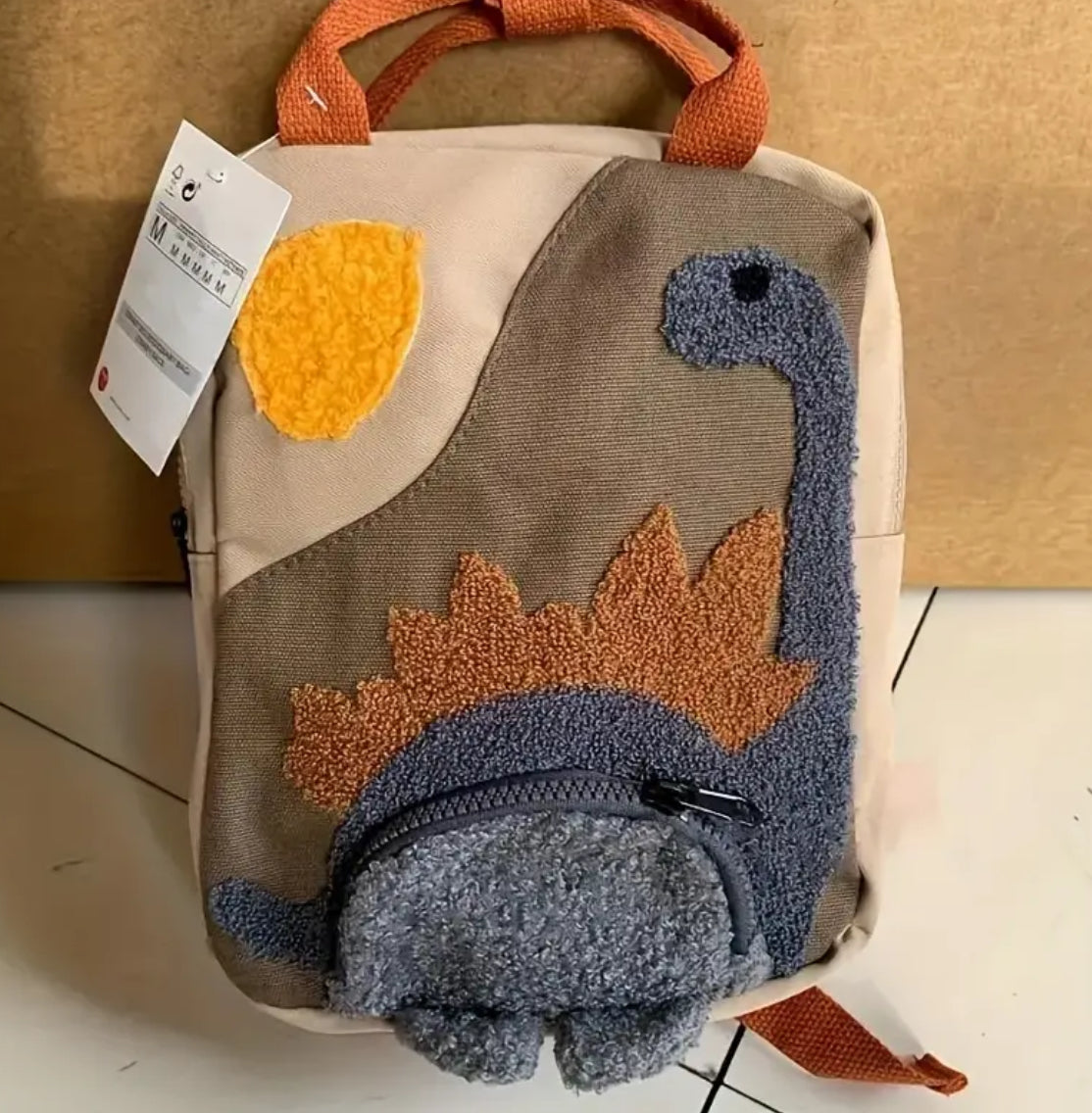 Mochila de lona con contraste de dinosaurios