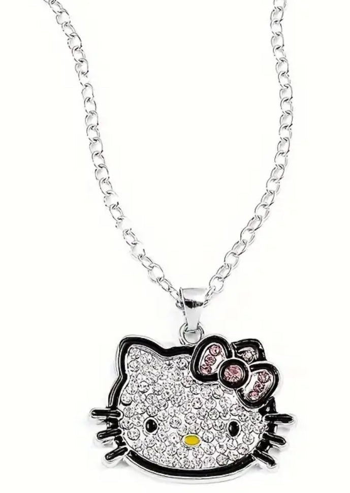 Conjunto de joyas de Hello Kitty con licencia de Sanrio: encantador collar y pendientes con colgante