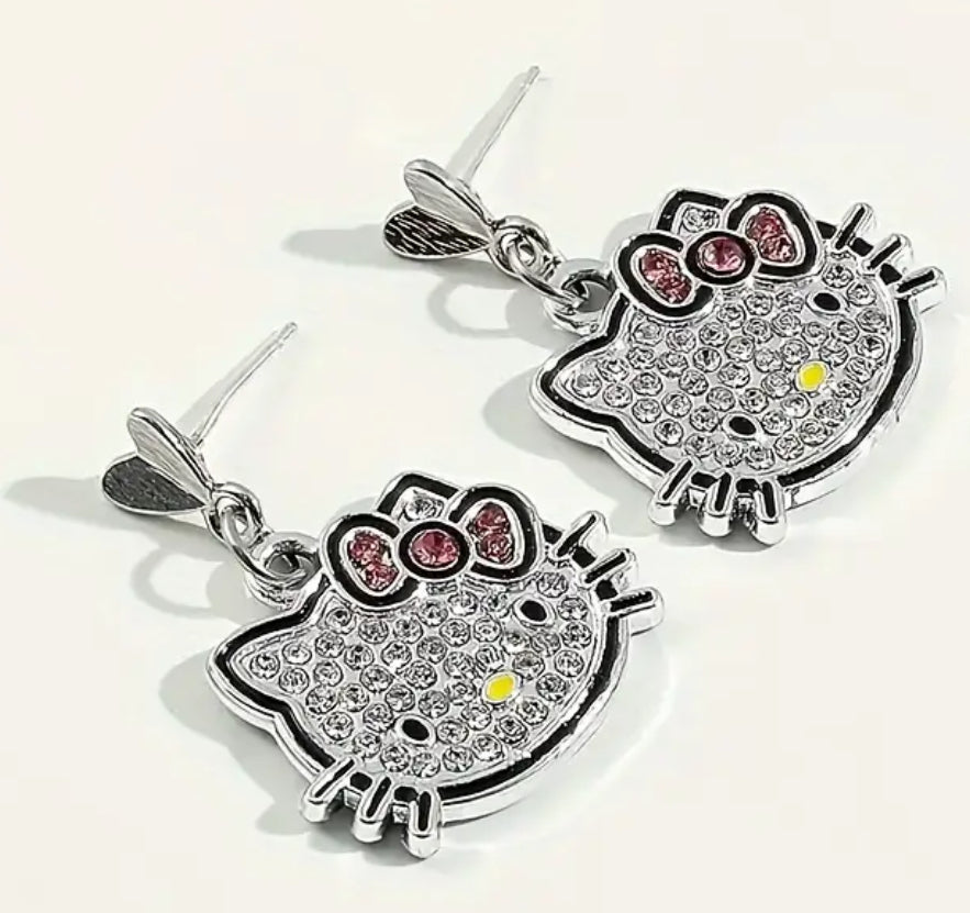 Conjunto de joyas de Hello Kitty con licencia de Sanrio: encantador collar y pendientes con colgante