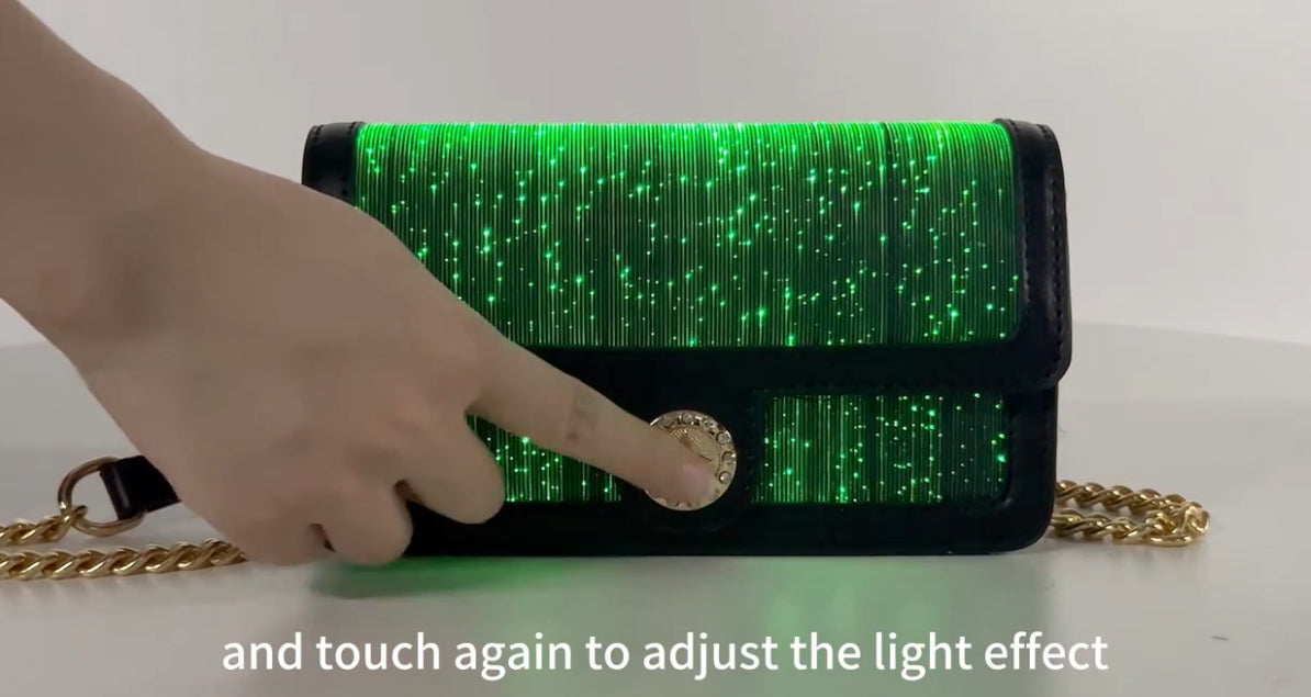 Çanta me tufë prej lëkure artificiale "LED Glitter", me 7 ngjyra LED