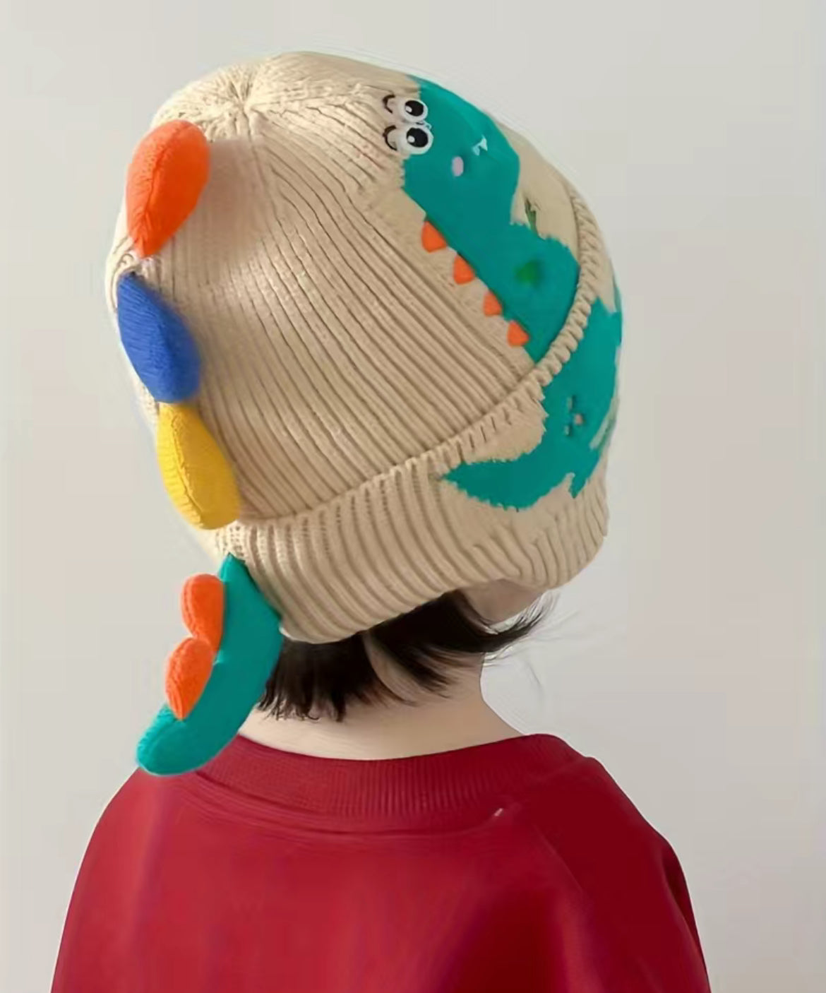 Gorro de punto de invierno con diseño de dinosaurios para niños y niñas, protección para los oídos a prueba de viento, gorro grueso y cálido